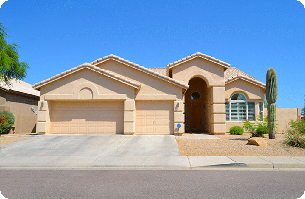 Why Cash Offers Are Lower Than Market Value (and Why You Might Still Come Out Ahead) 6 Desert home with garage and cactus