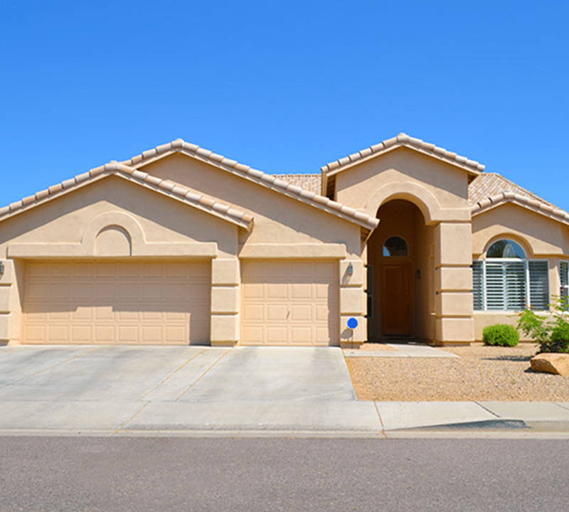 Why Cash Offers Are Lower Than Market Value (and Why You Might Still Come Out Ahead) 6 Desert home with garage and cactus