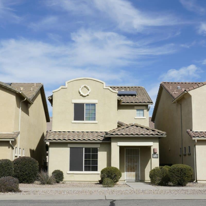 How to Avoid Foreclosure in Las Vegas: What to Do When Time Runs Out 10 Two houses with blue sky backdrop